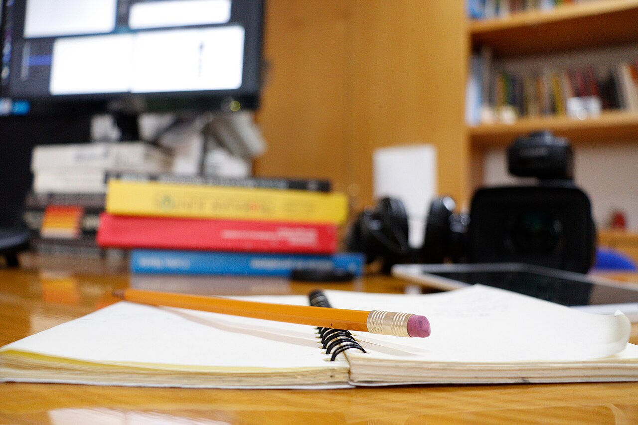 Notebook and pencil